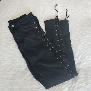 Black 3/4 skinny jeans with studded holes